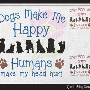 Può includere: Disegno ricamato con il testo "Dogs make me happy, Humans make my head hurt". Il disegno presenta una fila di sagome di cani e impronte di zampe.