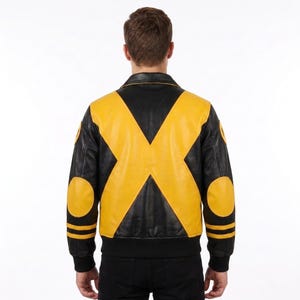 May include: A black and yellow leather jacket featuring a large yellow X design on the back, yellow circular elbow patches, and two horizontal yellow stripes on each sleeve. The jacket has a classic collar, ribbed cuffs, and a ribbed hemline.