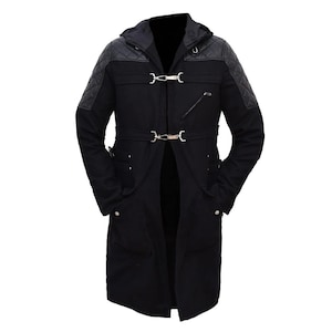 May include: A black long coat featuring a hood, quilted leather-like shoulder panels, and two silver-toned metal hook-and-loop closures on the front. The coat includes a diagonal zippered chest pocket and two lower pockets with silver-toned button accents.