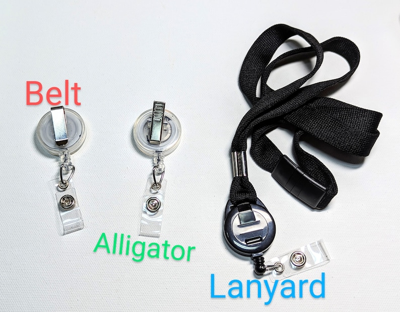 May include: A collection of badge holders and a lanyard. Two badge holders with a belt clip and a clear plastic strap are shown. A black lanyard with a retractable badge holder and a black plastic clasp is also included. The word "Belt", "Alligator", and "Lanyard" are written on the image.
