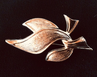 Vintage guldfärgad bandbrosch