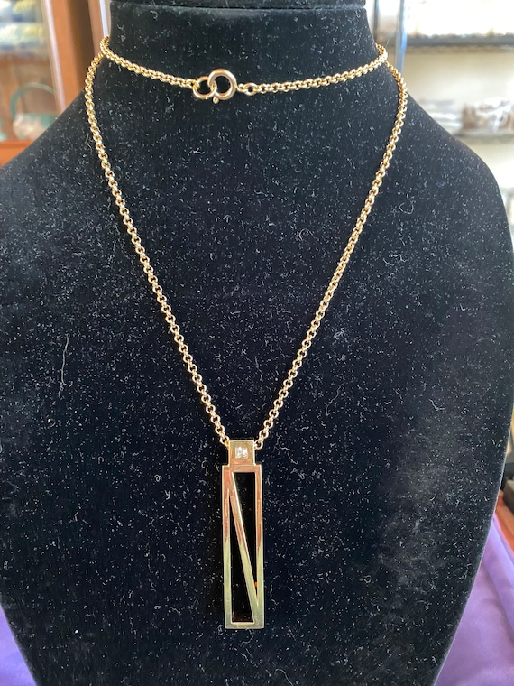 Long Gold tone chain with Rectangular N Pendent - image 1