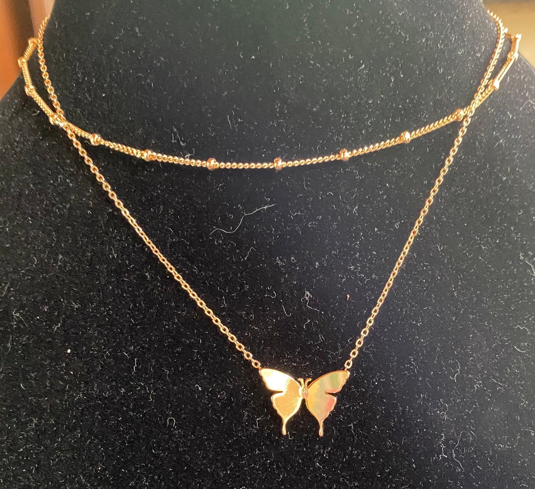 NIB Mevecco Goldtone Butterfly Necklace With an Extra Necklace to