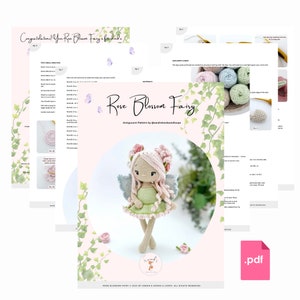 May include: A crochet pattern for a Rose Blossom Fairy amigurumi doll. The pattern includes instructions and photos for making the doll, which is dressed in a green dress with pink accents and has a pink flower crown. The pattern is available as a PDF download.