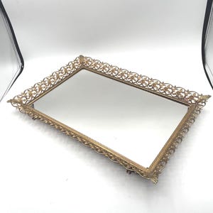 May include: A rustic wooden sign with the text "Welcome to our home" in white lettering. The sign features a distressed finish and a simple, inviting design, perfect for a front porch or entryway.