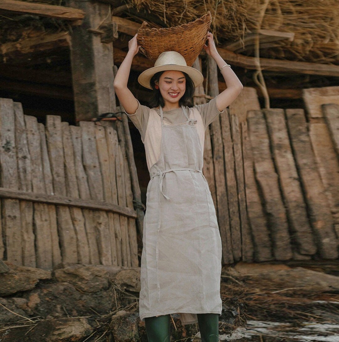 linen apron dress Lace Embroidery Available colours include olive green checkered and denim blue stripes V-Neck Linen Apron Dress |