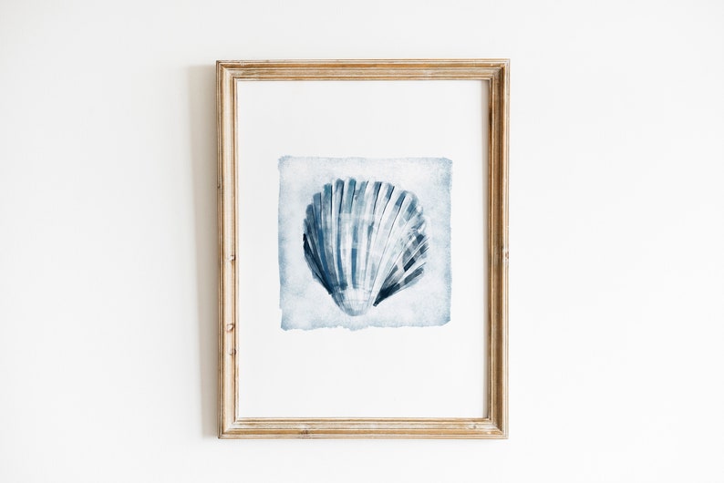 May include: A framed watercolor painting of a blue seashell on a white background. The seashell is the focal point of the painting and is depicted in a realistic style.
