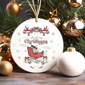 Sleighing Christmas Vintage Graphic Xmas Ornament, Be Merry And Bright Classic Christmas Scene Of Gifts Antlers Santa&#39;s Sleigh Bells & Holly