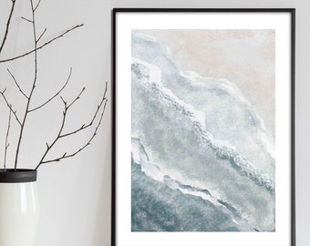 May include: Abstract watercolor painting of a landscape with blue and white colors. The painting is framed in a black frame.