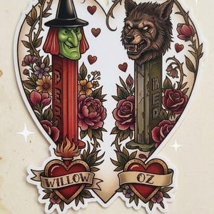 May include: A sticker featuring two stylized PEZ dispensers: a witch and a werewolf, framed within a heart shape. The witch has a green face and red hair, while the werewolf has a snarling expression. Floral and heart motifs surround the dispensers, with the words "Willow" and "Oz".