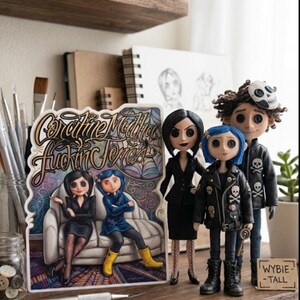 May include: A collection of handmade Coraline-themed dolls and artwork. The dolls feature detailed outfits and unique hairstyles. The artwork includes a sign with the text "Coraline Madha Fucking Jones" and illustrations. The items are displayed on a wooden shelf.
