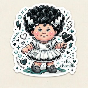 May include: A sticker featuring a cartoon character with black, curly hair styled with white streaks, wearing a white dress and holding a heart-shaped rattle. The design includes hearts, lightning bolts, and the text "che chemilk".
