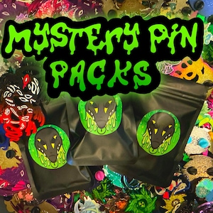May include: Three black opaque pouches featuring circular stickers with a black and yellow creature graphic dripping in green slime. The text MYSTERY PIN PACKS in a dripping green font is centered above the pouches, surrounded by various pins.