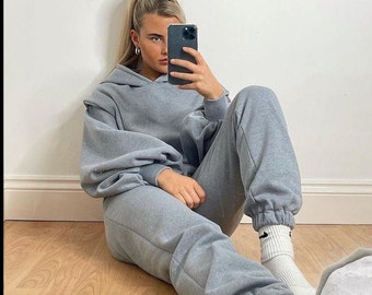 Graue Sweatshirt Hoodie und Jogger Sanzüge