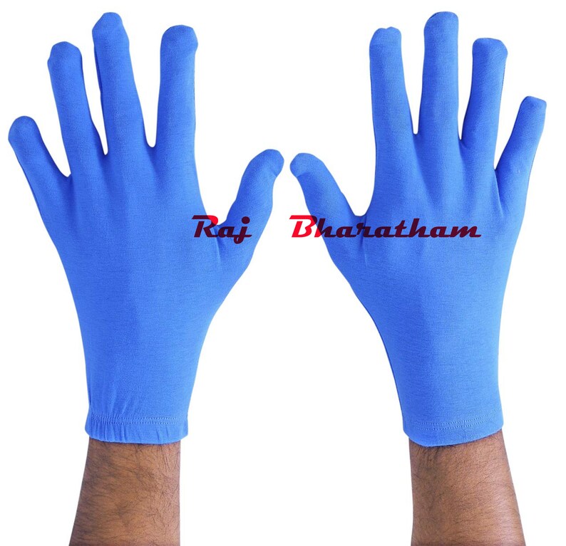 May include: A pair of bright blue cotton gloves. The gloves are seamless and have a close-fitting design.