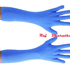 May include: A pair of long, blue, cotton gloves. The gloves are seamless and extend to the elbow.