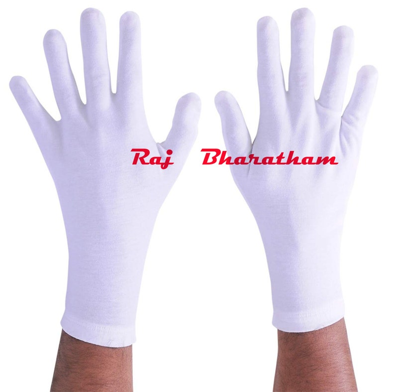 May include: A pair of white cotton gloves with the text "Raj Bharatha" printed on the back of the right glove.