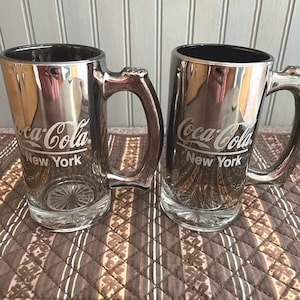 Iridescent Silver Colored Coca Cola New York Beer Mugs Steins Collectible Coke Glasses Set of 2