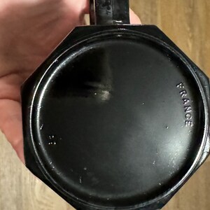 May include: Black octagonal mug with the word "FRANCE" printed on the bottom.