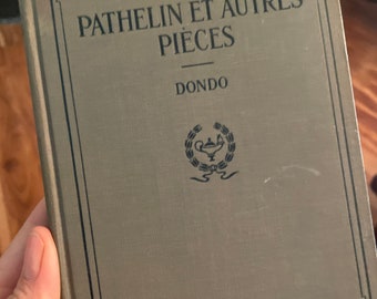May include: A vintage book titled "Pathelin et Autres Pieces" by Dondo. The book is part of the Heath's Modern Language Series and features a rooster illustration on the cover.