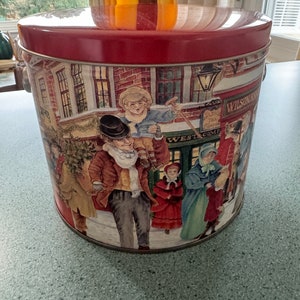 Vintage Hometown Victorian Christmas Collectible Tin Round Storage Pail Holiday Decor Red Tin with Handle Christmas Scene 1/2 Gallon