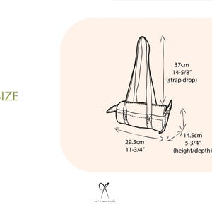 May include: A black and white line drawing of a tote bag with a strap drop of 14-5/8 inches and a height/depth of 5-3/4 inches. The bag is 11-3/4 inches wide.