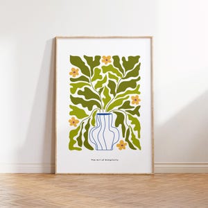 May include: A white vase with blue stripes filled with green stylized leaves and yellow flowers. The text "The Art of Simplicity" is at the bottom of the image.
