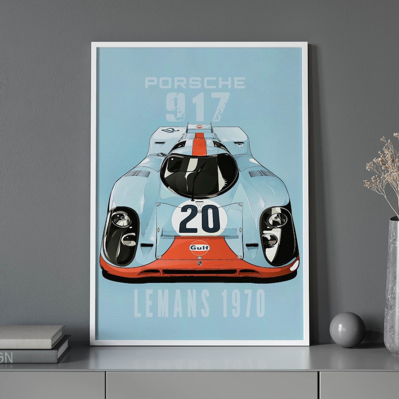 May include: A blue and orange vintage race car poster with the text "Porsche 917 Le Mans 1970".