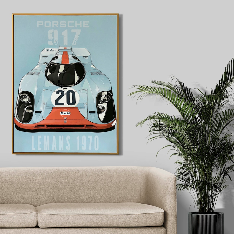 May include: A blue and white vintage poster featuring a blue Porsche 917 race car with the number 20 and the Gulf logo. The poster reads "Porsche 917 Le Mans 1970".