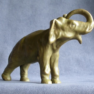 A Vintage Ornamental Ceramic Elephant