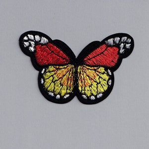 Geborduurde donkeroranje vlinderpatch opstrijkbare insectenappliqué voor kleding