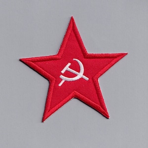May include: A red embroidered star with a white hammer and sickle in the center.