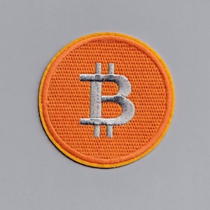 May include: Orange and white embroidered patch with the Bitcoin symbol "B" in the centre.