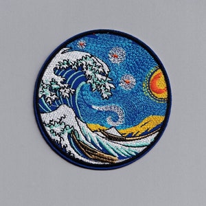 May include: Round embroidered patch merging Hokusai's wave design with Van Gogh's starry night. The patch features a blue sky with swirling stars, a yellow sun, and a large wave. It has a dark blue border.