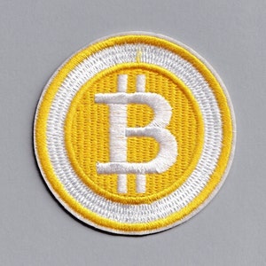 May include: A white and yellow embroidered patch with a white Bitcoin symbol in the center.