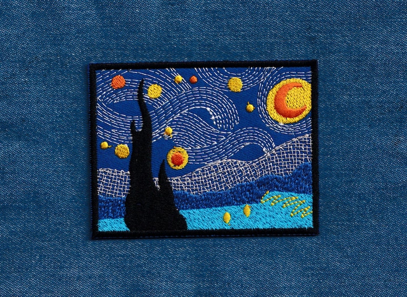 May include: Embroidered patch featuring a starry night scene with a crescent moon, swirling clouds, and a tall, dark tree. The patch is on a blue denim background.