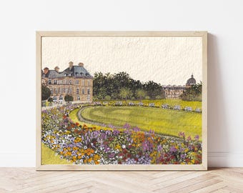 May include: Watercolor painting of a European estate with a manicured lawn and colorful flower beds. The artwork is framed in a light wood frame and depicts a sunny day with a clear sky. The architecture includes a large building with a domed roof.