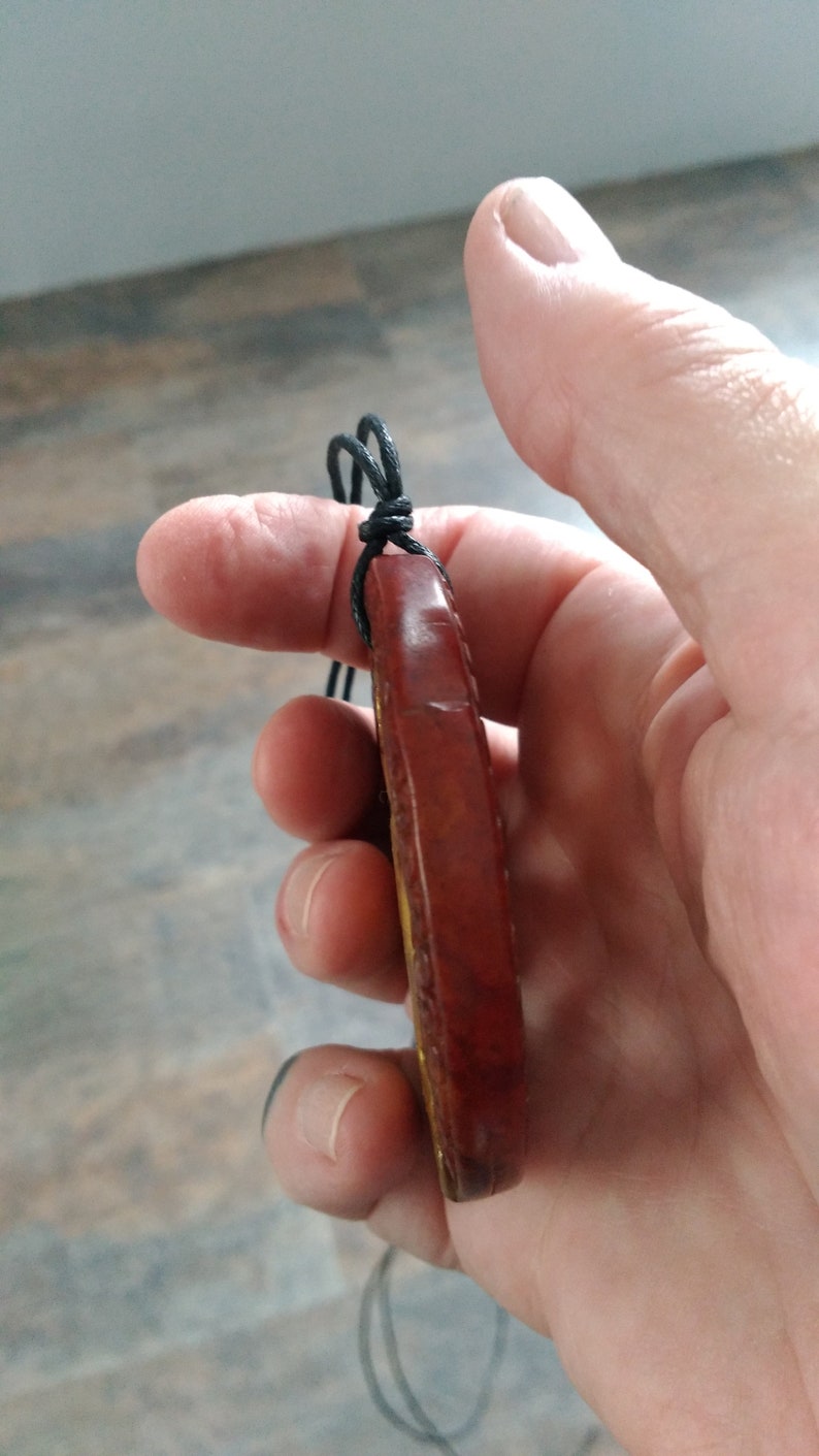 with adjustable necklace. Jade man and woman pendant
