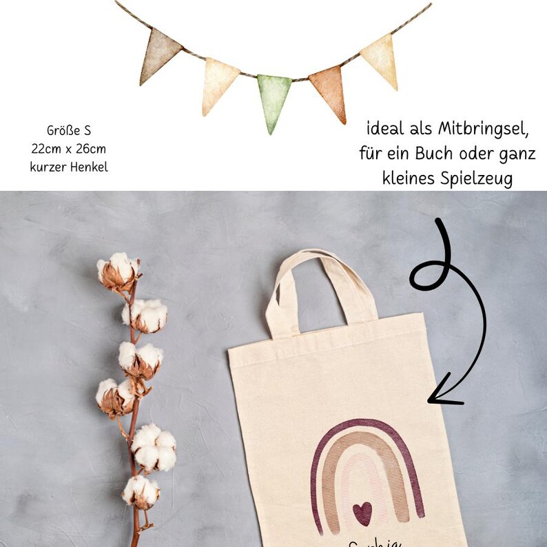 May include: A beige tote bag with a rainbow design and the name "Sophia" printed on it. The bag is 22cm x 26cm. A banner of small, colorful flags hangs above the bag. A sprig of cotton is on the left.