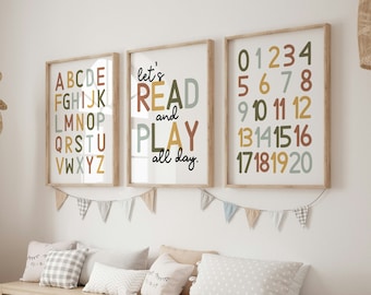 May include: Three colorful educational posters for a child's room. The first poster has the alphabet in colorful letters. The second poster says "Let's read and play all day." The third poster has the numbers 1 through 20 in colorful numbers.
