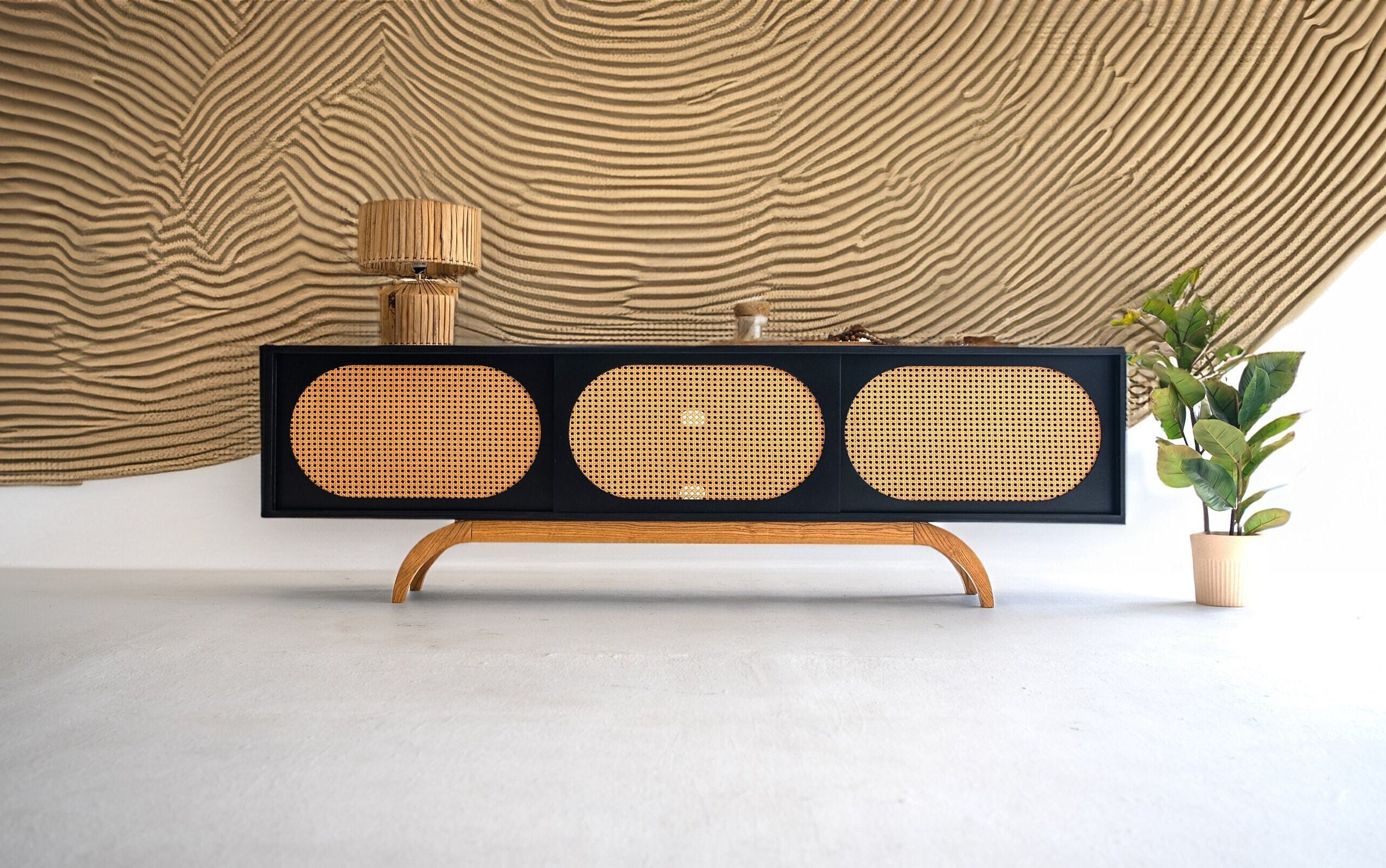 Black and rattan media console best sale