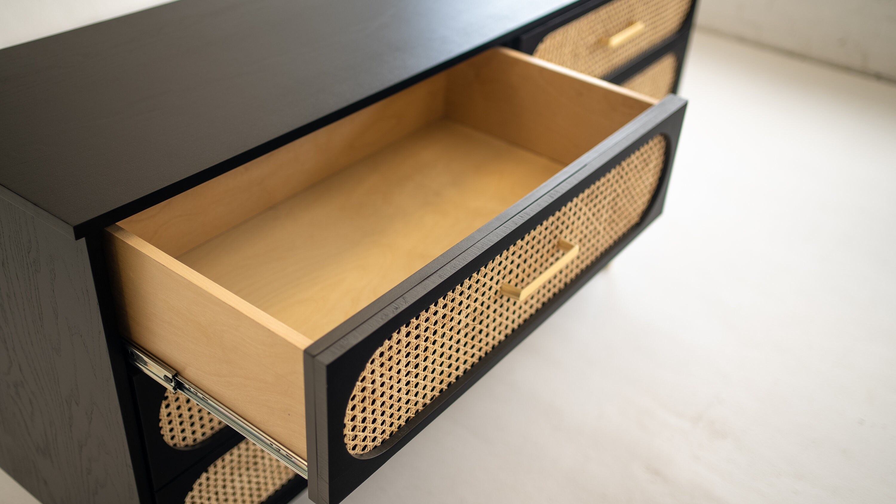 black dresser with cane webbing 59x15x26 in Black Arched Modern Cane Rattan 6 Drawer Dresser