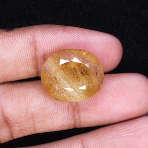 Naturalny kamień szlachetny topaz cesarski: szlif owalny 15 x 17 mm, jakość AAA+