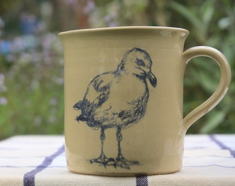 Ceramic cup handpotted with bird motif "Seagull"