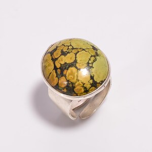 Sterling Silver Turquoise Ring: Round Cut Gemstone