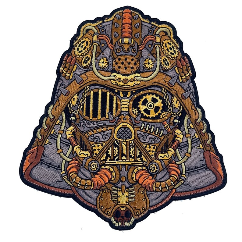 May include: A steampunk-style Darth Vader helmet patch with intricate details in gold, brown, and gray. The helmet features gears, pipes, and other mechanical elements.