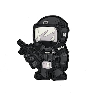 May include: Black and white cartoon patch of a police officer wearing a helmet and holding a gun. The patch says "WEGA" and "POLIZEI" on it.