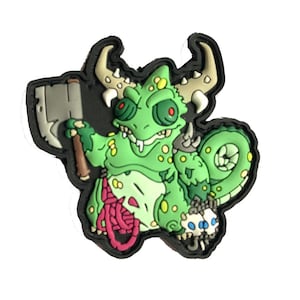 May include: A green monster-like figure with red eyes, holding an axe and a skull, set against a black background. The figure has horns and a long tail. The design is a cartoonish illustration.