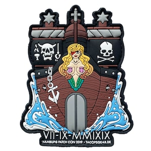 May include: A vibrant patch depicting a pirate ship with a mermaid figurehead. The design incorporates a skull and crossbones, anchor, and stylized waves. The text "VII-IX-MMXIX" and "HAMBURG PATCH CON 2019 - TACOPSGEAR.DE" are also visible.