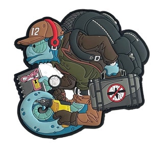 May include: A cartoon-style patch featuring a blue creature wearing a brown baseball cap with the number 12, headphones, and a brown jacket. The creature carries a magnifying glass, a notebook, and a toolbox with a mosquito crossed out.